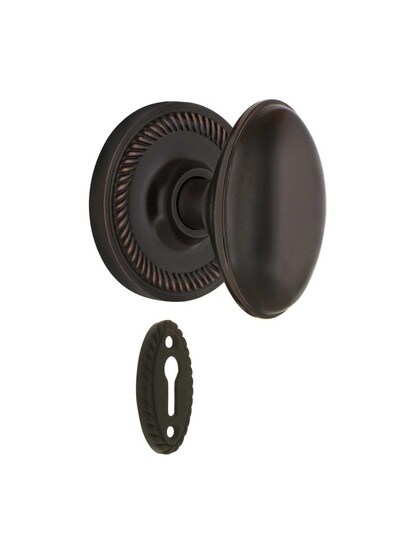 Rope Rosette Mortise-Lock Set with Homestead Knobs in Timeless Bronze.